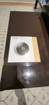 Thermostat nest dans son emballage .