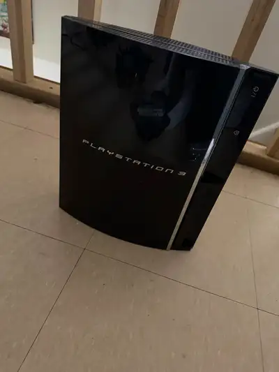 Selling a Sony PlayStation 3 (PS3) console in black. Great for anyone looking to play classic PlaySt...