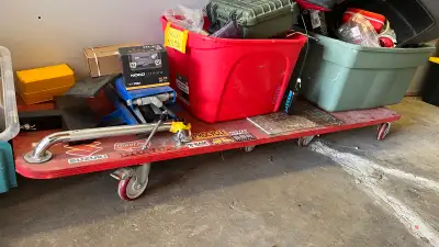 Wooden dolly with heavy duty wheels, eight wheels, plywood is stair tread plywood one and 1/8 Includ...