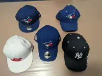 Various Blue Jays and New York Yankees Hats