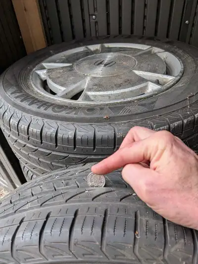 4 used Summer tires on rims with Honda hubcaps. Worth it just for the rims and caps. 195/65 R15