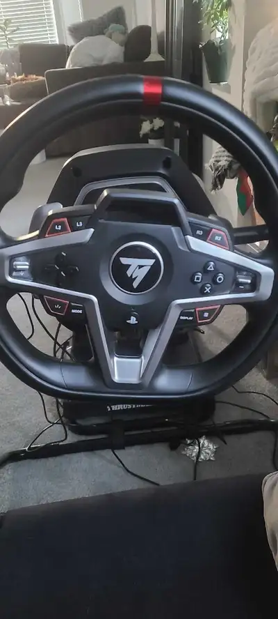 I am selling my thrustmaster steering wheel with seat. I have used both 2 times, I just don't have t...
