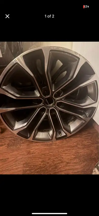 These are used Grand Wagoner rims, each featuring a detailed multi-spoke design. They have some sign...