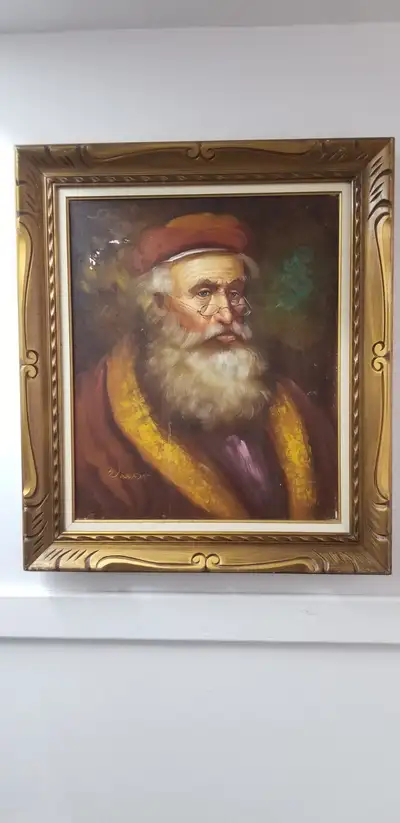 Framed oil painting , depicts an elderly man with long white beard. Gold- colored frame . Artist's s...