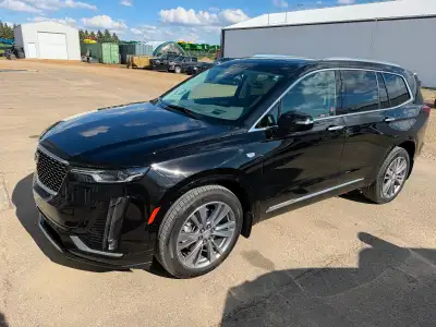 This stunning, like-new Cadillac XT6 AWD offers a sophisticated driving experience with its sleek bl...