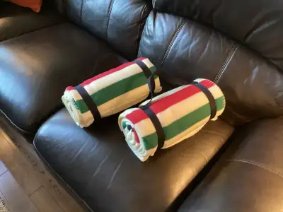 Iconic Hudson’s Bay Company fleece throw blanket with the distinctive green, red, yellow and indigo...
