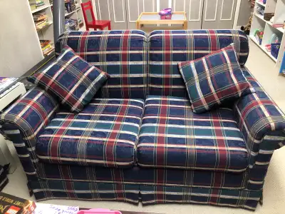 Barely used matching chesterfield ( sofa bed) and love seat, View more