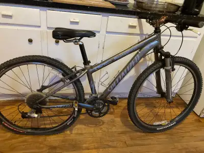 This is a very light 13.5 inch adult mountain bike in great condition. Aluminum. Front suspension. X...