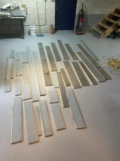 Stack of reclaimed wall board pieces. , View more
