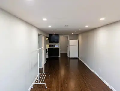 Separate entrance and one/two parking spaces. Large living room and kitchen/dining area. Close to Er...