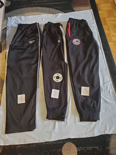 I'm offering a selection of men's track pants in size XXL, 2XL and 34. These pants are great for wor...