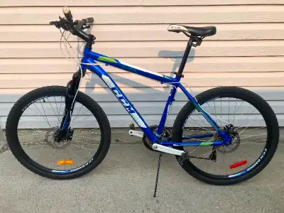 21 speed CCM mountain bike with 2 disk brakes and front buffer 18” frame 26” tires/wheels for sale i...