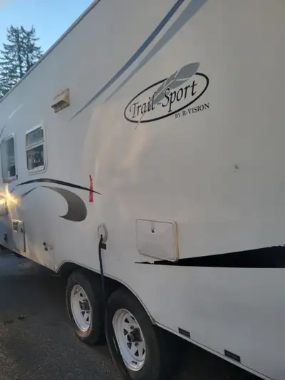Trailer with queen bed pull out. Double bed and bunk beds. Ib excellent condition. Need gone as soon...