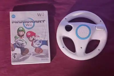 Mario Kart wii complete with wheel / disc has scratches and is u, View more