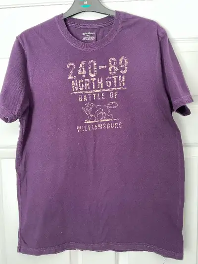 DKny jeans men’s purple T-shirt Vivid purple colour with ‘battle of Williamsburg’ print on front Has...