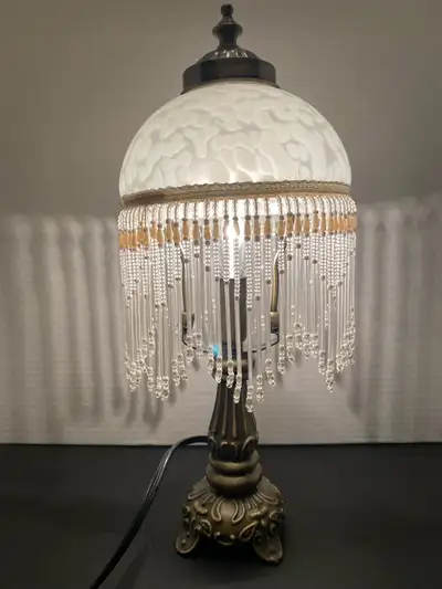 14” tall Illuminate your space with this elegant beaded table lamp, perfect for adding a touch of vi...