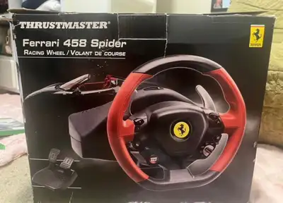 Selling my Thrustmaster Ferrari 458 Spider racing wheel. Works great and perfect for racing games. I...