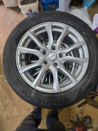 4- 5 bolt rims off of Honda civic. Fits 16 inch tire. Rims come with tires on, probably good for 1 m...