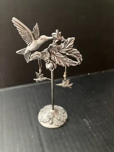 charming pewter-style hummingbird earring display stand , . delicate stand features an intricate flo...