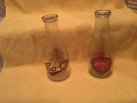 Vintage glass stamped milk bottles
