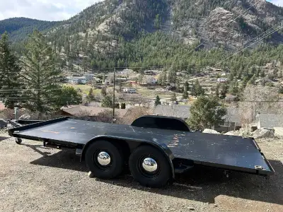 U built flat deck trailer. Built with 4" channel frame, 3" channel crossmembers and .125" steel deck...