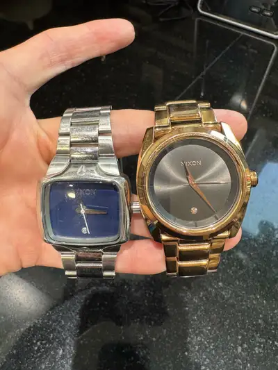 Women’s Nixon watches VIP Pass Small Player Blue face, silver band has a lil scuff on the face, band...