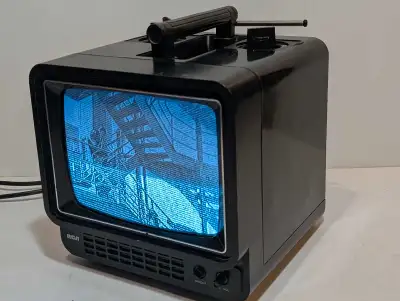 Relive the nostalgia with this vintage ANALOG 1980 RCA 9" Portable TV! This classic B&W television i...
