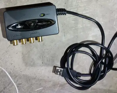 The Behringer UCA200 is a legacy, entry-level, 2-in/2-out USB audio interface featuring RCA analog i...