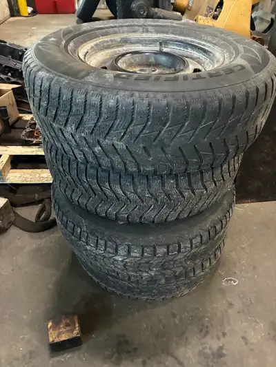 4- ford ranger 15” steel wheels, 2 tires are shot 2 are in okay condition.