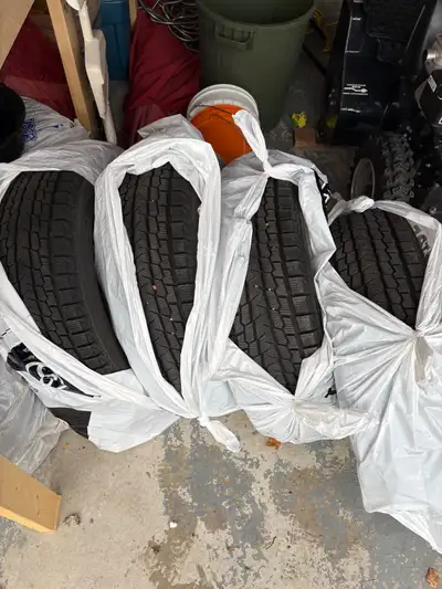 Set of (4) Yokohama Ice Guard G075 winter tires. (Not on rims) Size is 225/65/R17. Paid $1300 for th...