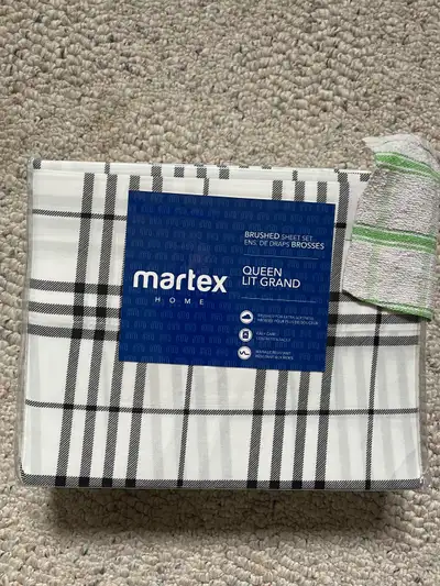 Add a touch of elegance to your bedroom with this brand new Martex Home queen-size brushed sheet set...