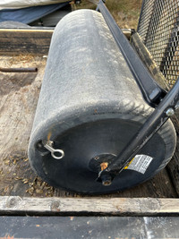 Pull type landscaping roller 