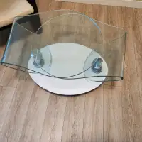Glass swivel coffee table