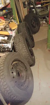 Jantes en acier avec pneus d'hiver à crampons dim  215/65R16