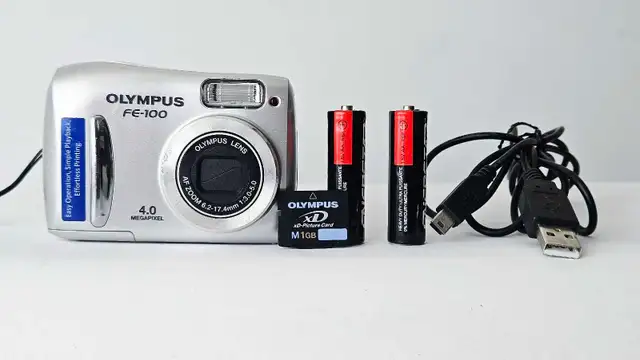Olympus FE-100  4.0 MP  Compact Digital Camara557472365696798726