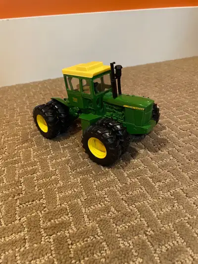 John Deere 7520 diecast model for sale. In great condition except the cab is a bit loose and can com...