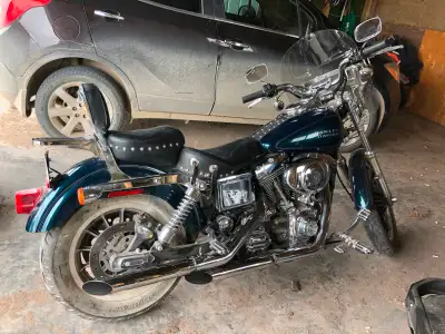 2002 Dyna low rider nice condition new tires and battery lots of chrome. Reason for selling no time...