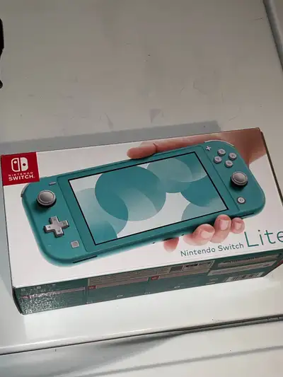 Nintendo Switch Lite turquoise brand new!!, View more
