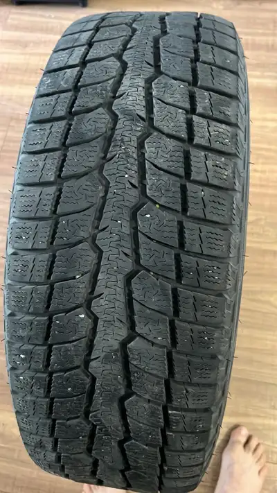 For sale is a winter tire with a size of 225/65R17 102H. These tires have been previously used but a...