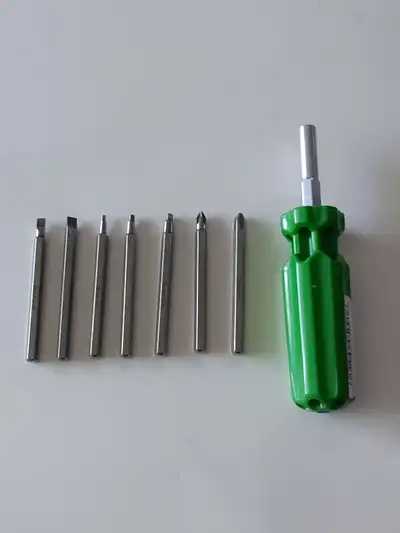 I am selling a used Canadian-made Picquic Screwdriver. This is their slim Multique model. It has 7 c...