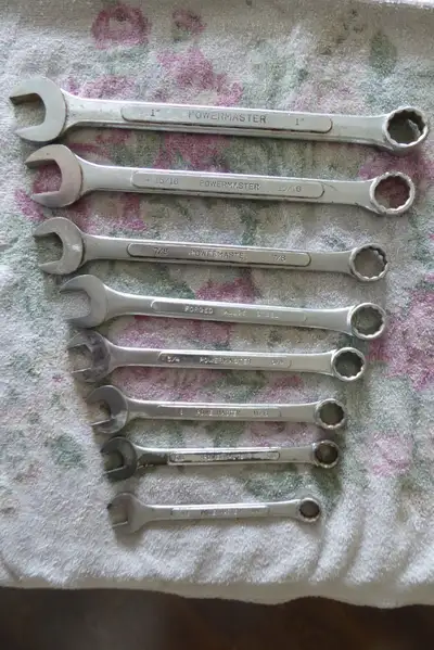 Powermaster Combination Wrenches SAE sizes: 1 inch, 15/16, 7/8, 13/16, 3/4, 11/16, 5/8, 9/16. The 13...