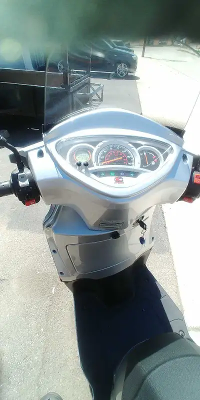 2010 Kymco People's 125cc 4 Stroke. Maintained Yearly Excellent Condition. New Battery. Very Comfort...