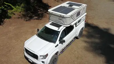 Truck Nest Pop-Up Camper Designed in Canada for North American adventures and built in China for exc...