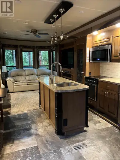 In immaculate condition. Lot and trailer are also available together for 199K. Located at Spider Lak...