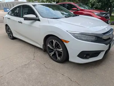 Honda Civic Touring sedan in excellent condition. Reliable, fuel-efficient, and meticulously maintai...