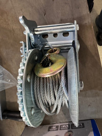 1200 Lbs hand winch, reversible, New.  Power fist