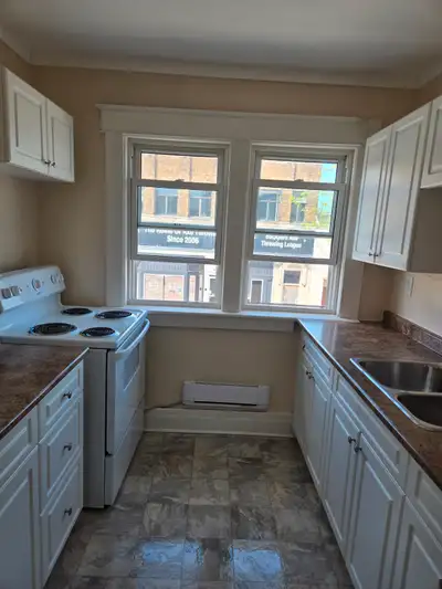 One Bedroom with Original Hardwood Floors in Quiet Building