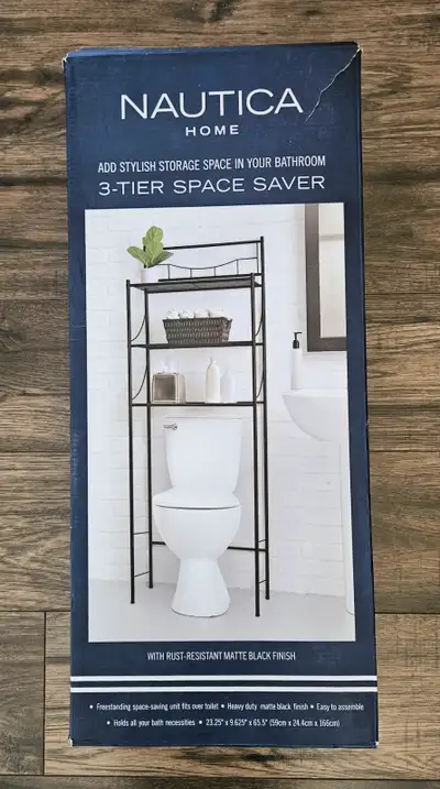 New (opened but unused) 3-tier bathroom shelf by Nautica Home. This freestanding unit fits over a to...