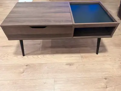 40 inch coffee table with passthrough storage and a lift-top surface that is great for work and has...