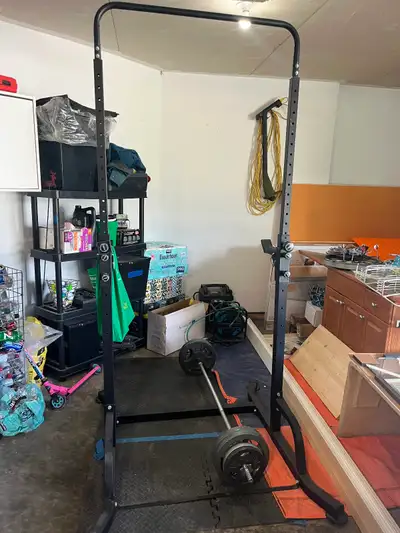 Squat rack and barbell with weights, View more